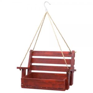 Red Hanging Porch Swing Bird Feeder made from wood with steel drainage grate hanging outdoors feeding backyard birds