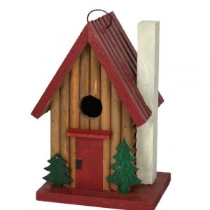 Rustic mountain cabin wooden bird house hanging outdoors for backyard birds