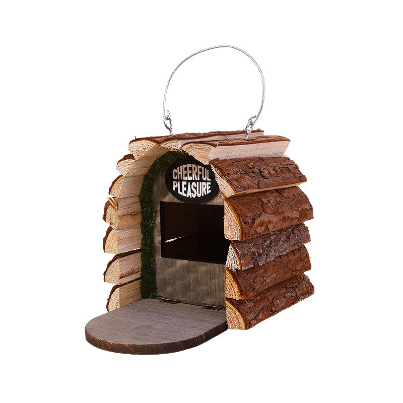 Rustic hanging wooden log cabin birdhouse with bark textures, covered front opening and metal hanging loop, bird perched - view 4