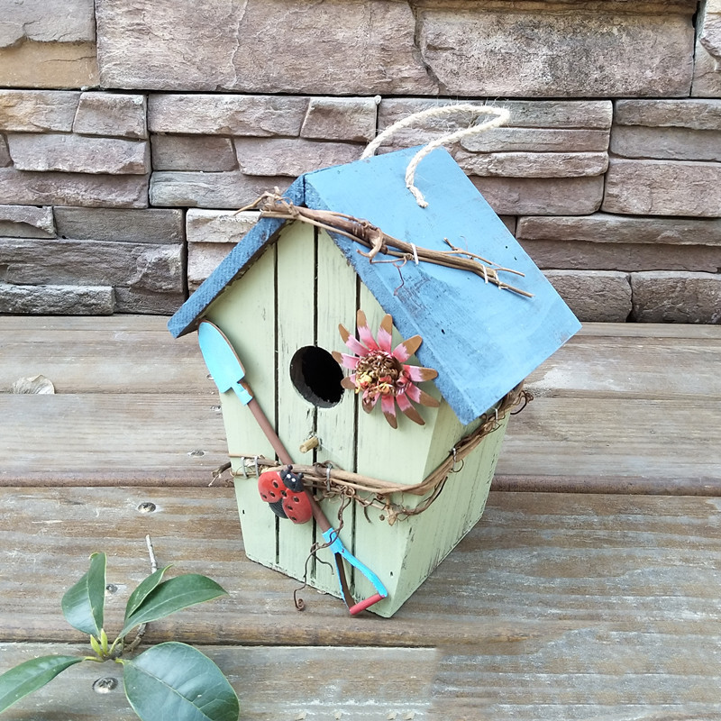 Rustic painted wooden hanging birdhouse in red with HOME sign, bumblebee and cottage roof - view 6