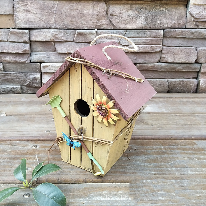 Rustic painted wooden hanging birdhouse in red with HOME sign, bumblebee and cottage roof - view 2