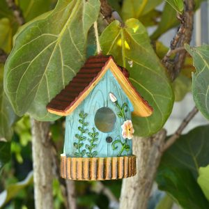 Decorative blue resin hanging birdhouse with floral design